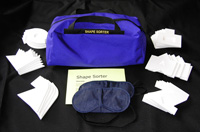 the shape sorter team building kit of 30 pieces, 12 blindfolds and one carry bag